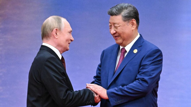 Putin Çini razı sala biləcəkmi?