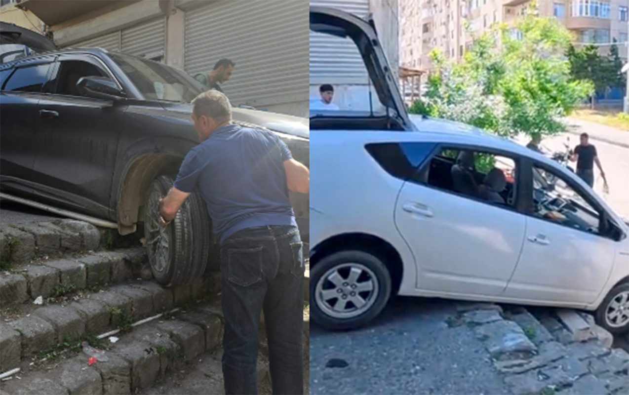 Yasamalda 2 avtomobil pilləkəndə ilişib qaldı - VİDEO